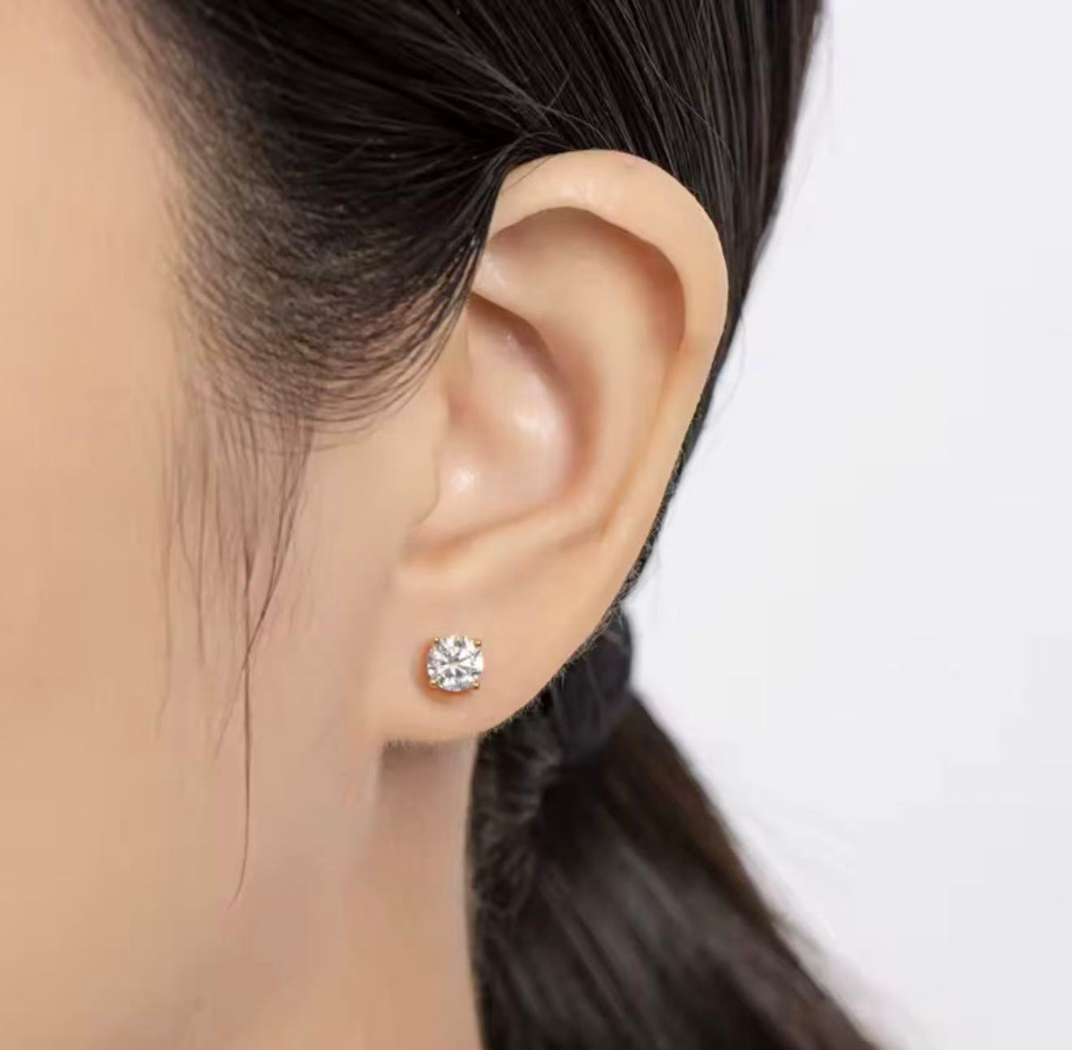 The Julietta Round Cut Moissanite Stud Earrings