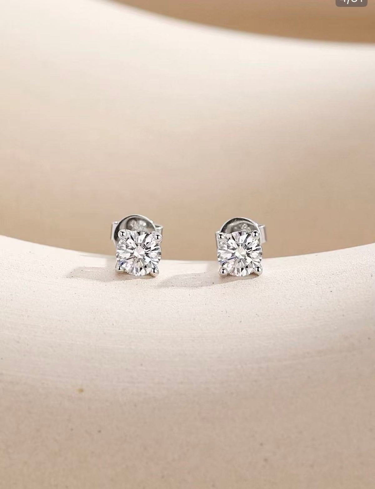 The Julietta Round Cut Moissanite Stud Earrings