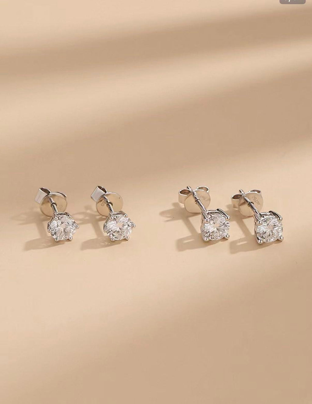 The Julietta Round Cut Moissanite Stud Earrings